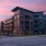 Exterior view of apartment buildings at Trailside at Reedy Point at night